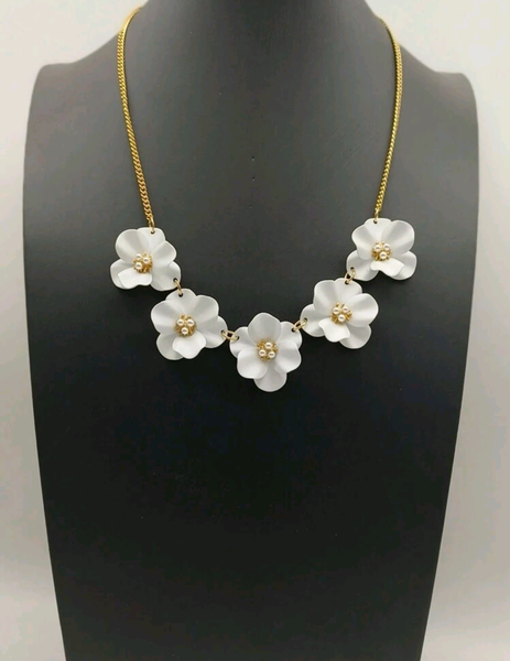 The Omla flower petal costume jewelry in white